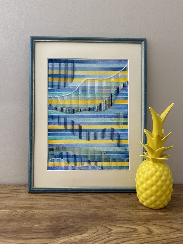 oeuvre d'aquarelle brodée en vagues bleues et jaunes